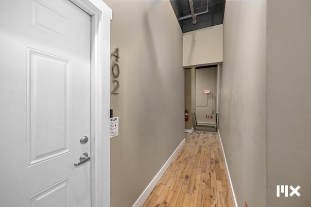 139 Pearl St NW, Grand Rapids, MI 49503 - corridor with light wood-style floors and baseboards