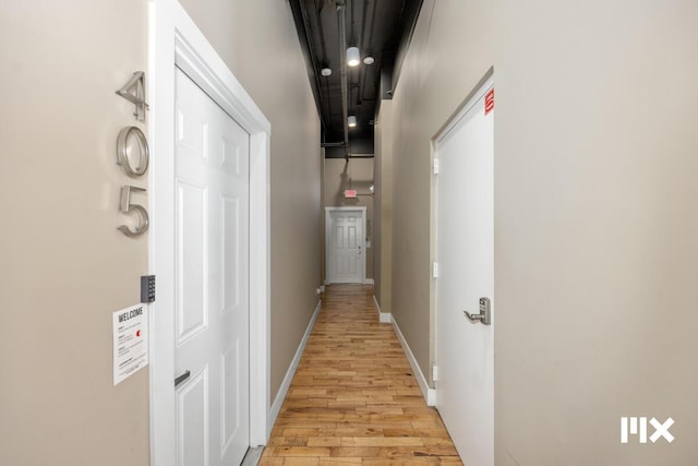 139 Pearl St NW, Grand Rapids, MI 49503 - hall featuring light wood-style flooring and baseboards