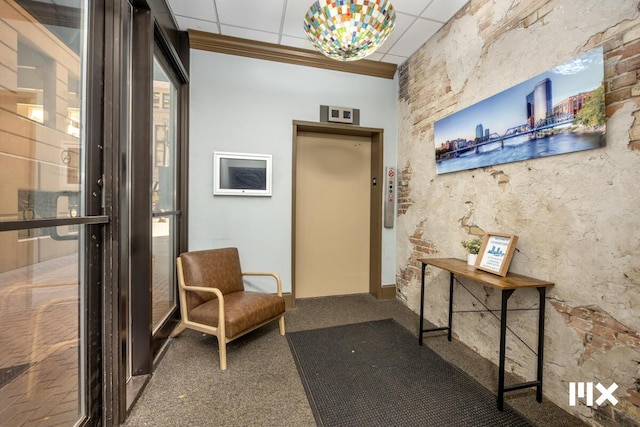139 Pearl St NW, Grand Rapids, MI 49503 - corridor with carpet flooring, elevator, and crown molding
