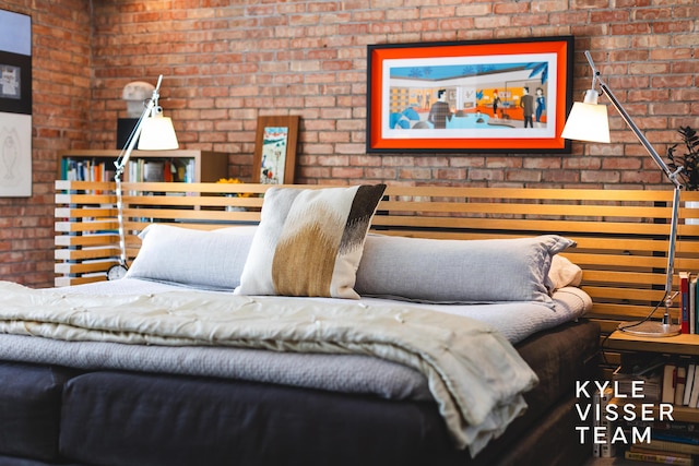 130 Robinwood Ave SE, Grand Rapids, MI 49506 - bedroom featuring brick wall