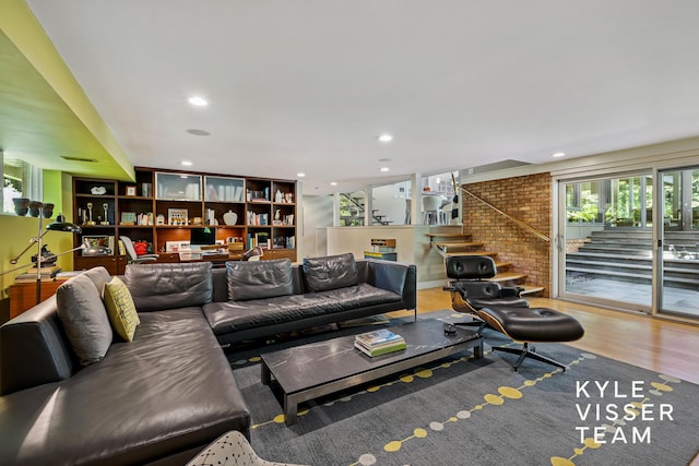 130 Robinwood Ave SE, Grand Rapids, MI 49506 - living area with stairway, wood finished floors, and recessed lighting