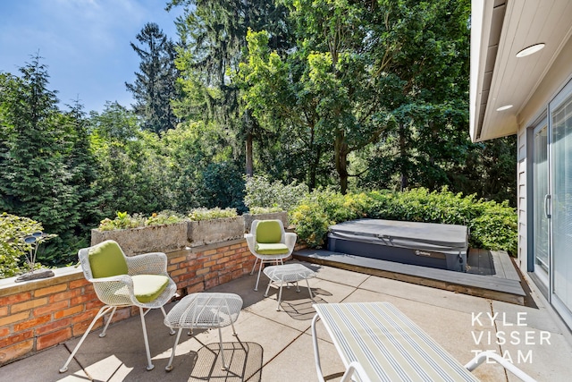 130 Robinwood Ave SE, Grand Rapids, MI 49506 - view of patio / terrace featuring a hot tub