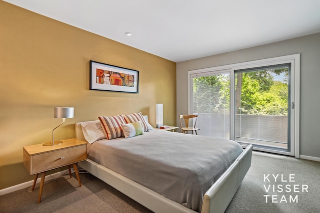 130 Robinwood Ave SE, Grand Rapids, MI 49506 - bedroom featuring carpet and access to outside