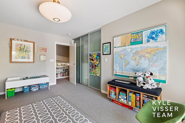 130 Robinwood Ave SE, Grand Rapids, MI 49506 - game room featuring carpet floors and baseboards