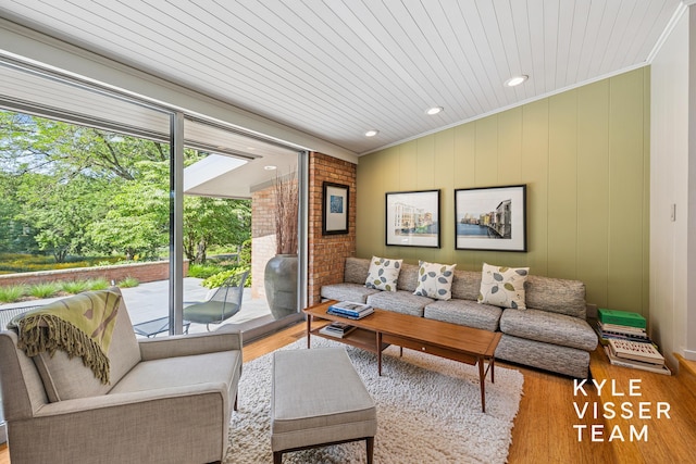 130 Robinwood Ave SE, Grand Rapids, MI 49506 - living area featuring ornamental molding, wood finished floors, and wooden ceiling