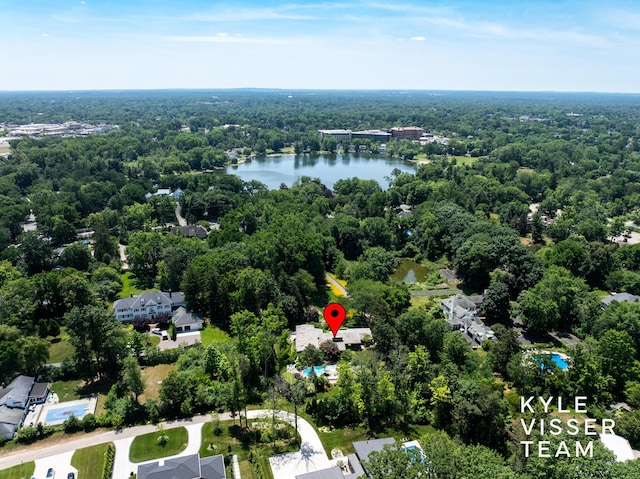 130 Robinwood Ave SE, Grand Rapids, MI 49506 - aerial view of property and surrounding area with a forest and a large body of water