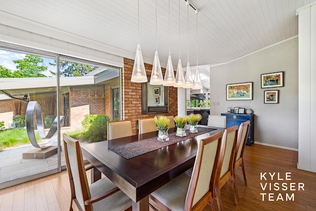 130 Robinwood Ave SE, Grand Rapids, MI 49506 - dining space featuring wood finished floors, ornamental molding, and wood ceiling