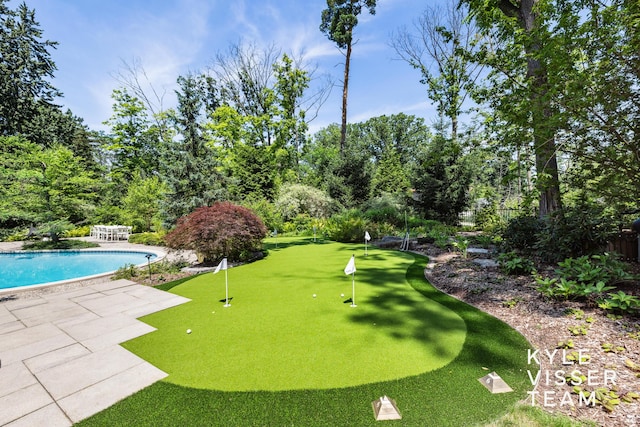 130 Robinwood Ave SE, Grand Rapids, MI 49506 - view of community featuring an area to practice putting, a pool, and a patio area