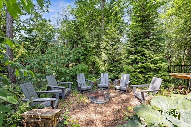 130 Robinwood Ave SE, Grand Rapids, MI 49506 - view of yard with an outdoor fire pit