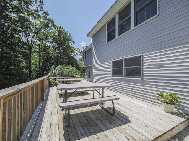 626 Skocelas Rd N, Manistee, MI 49660 - deck with outdoor dining area