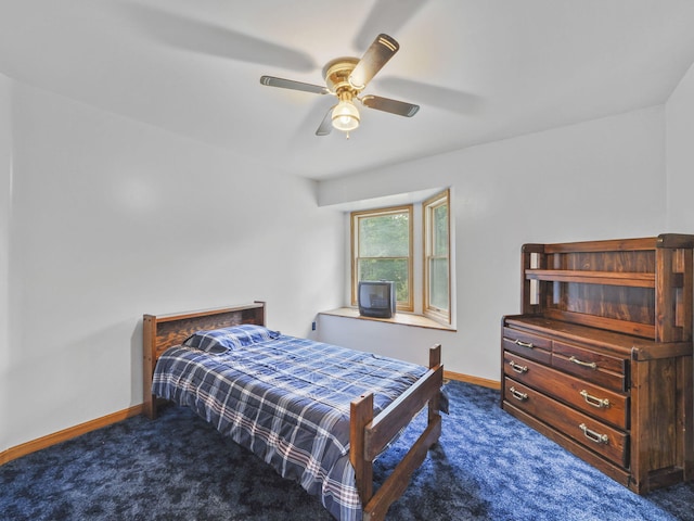626 Skocelas Rd N, Manistee, MI 49660 - bedroom with carpet floors and ceiling fan