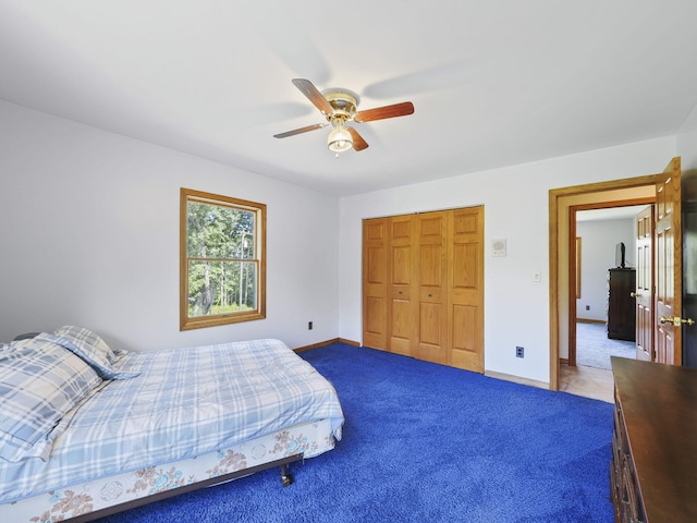 626 Skocelas Rd N, Manistee, MI 49660 - carpeted bedroom with a closet and ceiling fan