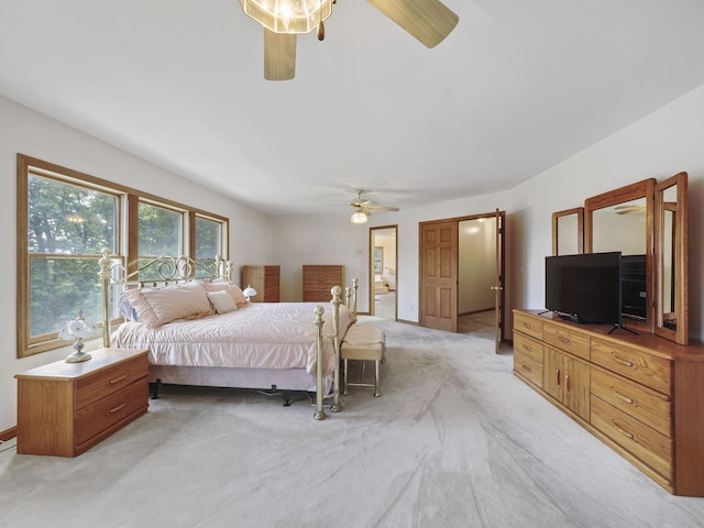 626 Skocelas Rd N, Manistee, MI 49660 - bedroom featuring light colored carpet and ceiling fan