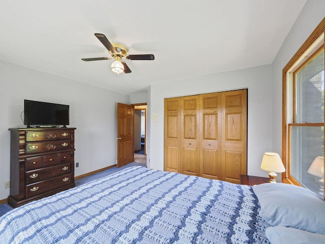 626 Skocelas Rd N, Manistee, MI 49660 - bedroom featuring a closet and ceiling fan