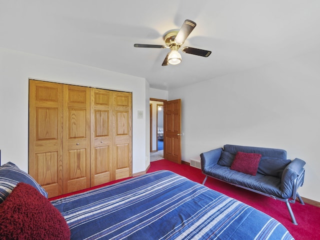 626 Skocelas Rd N, Manistee, MI 49660 - bedroom featuring carpet, a ceiling fan, and a closet