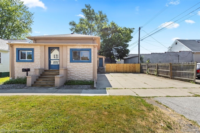 128 N Mary St, Marine City, MI 48039 - view of front of property featuring stone siding and entry steps