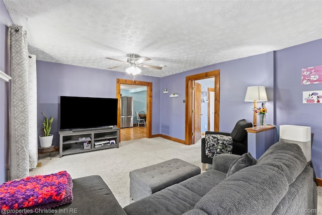 128 N Mary St, Marine City, MI 48039 - carpeted living room with a ceiling fan and a textured ceiling