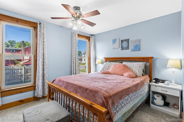 128 N Mary St, Marine City, MI 48039 - carpeted bedroom with multiple windows and a ceiling fan