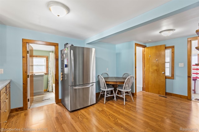 128 N Mary St, Marine City, MI 48039 - kitchen with freestanding refrigerator and light wood-style floors
