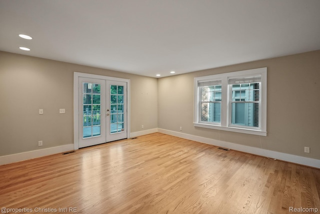 532 Wallace St, Southfield, MI 48009 - spare room with recessed lighting, wood finished floors, and french doors