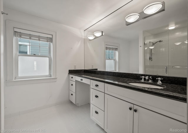 532 Wallace St, Southfield, MI 48009 - bathroom with vanity, a shower stall, and tile patterned flooring