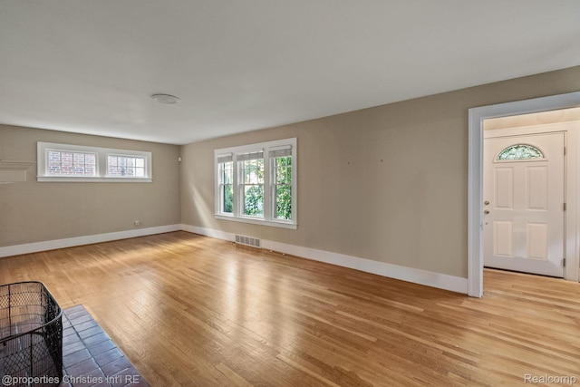 532 Wallace St, Southfield, MI 48009 - unfurnished living room with light wood-type flooring
