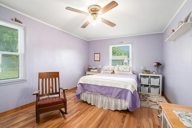 53266 US-131, Three Rivers, MI 49093 - bedroom featuring light wood-type flooring, ornamental molding, and a ceiling fan
