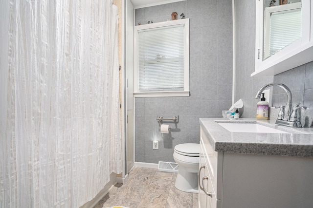 53266 US-131, Three Rivers, MI 49093 - bathroom with tile walls, vanity, and a shower with shower curtain