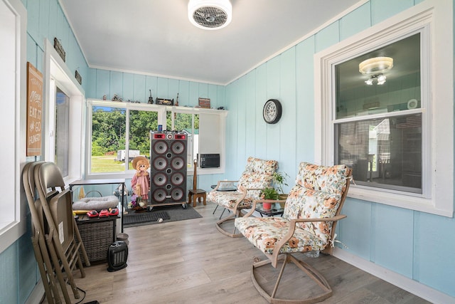 53266 US-131, Three Rivers, MI 49093 - sitting room featuring wood finished floors, a decorative wall, and ornamental molding