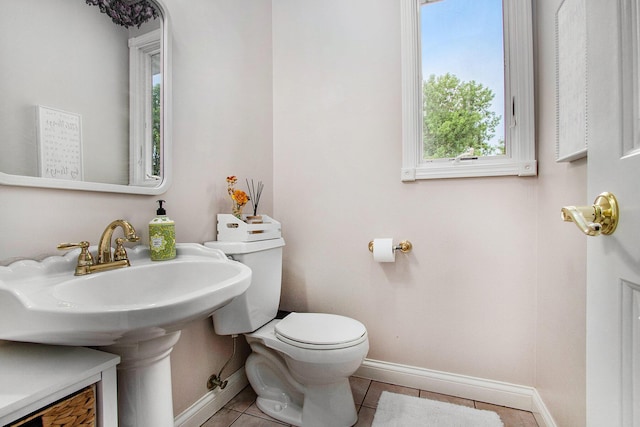 4202 Courtney St, Saint Joseph, MI 49085 - half bath with toilet and tile patterned flooring