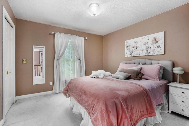 4202 Courtney St, Saint Joseph, MI 49085 - bedroom featuring light carpet, a textured ceiling, and access to exterior