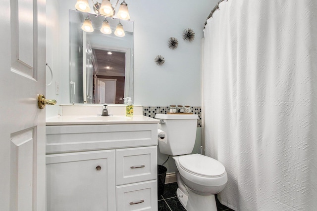 4202 Courtney St, Saint Joseph, MI 49085 - bathroom featuring vanity, tile patterned flooring, a shower with curtain, and tile walls