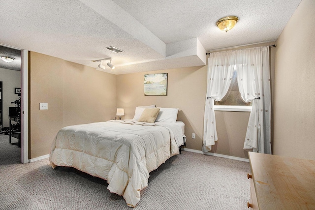 4202 Courtney St, Saint Joseph, MI 49085 - carpeted bedroom featuring a textured ceiling and baseboards