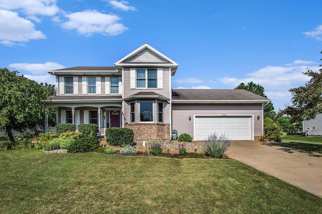 4202 Courtney St, Saint Joseph, MI 49085 - view of front facade with an attached garage, concrete driveway, a front yard, and covered porch