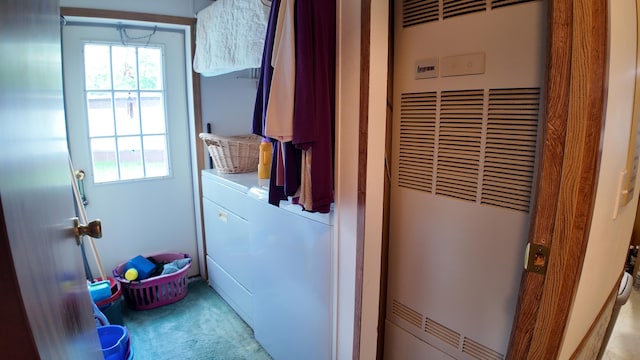 1410 Country View Ct NW, Sparta, MI 49345 - laundry area with a heating unit and light carpet