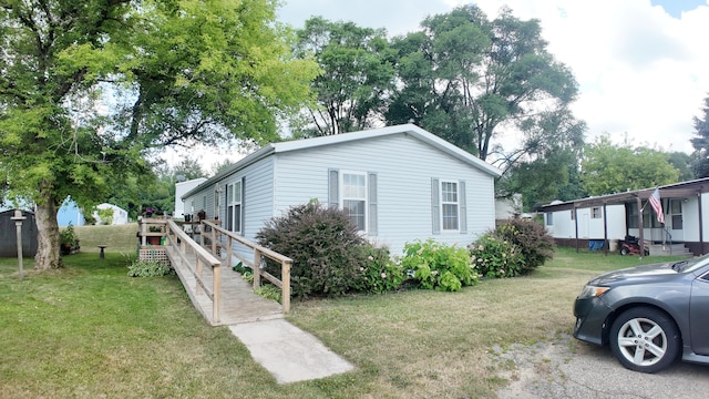 1410 Country View Ct NW, Sparta, MI 49345 - view of front of house featuring a front yard