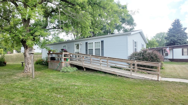 1410 Country View Ct NW, Sparta, MI 49345 - manufactured / mobile home with a deck and a front yard