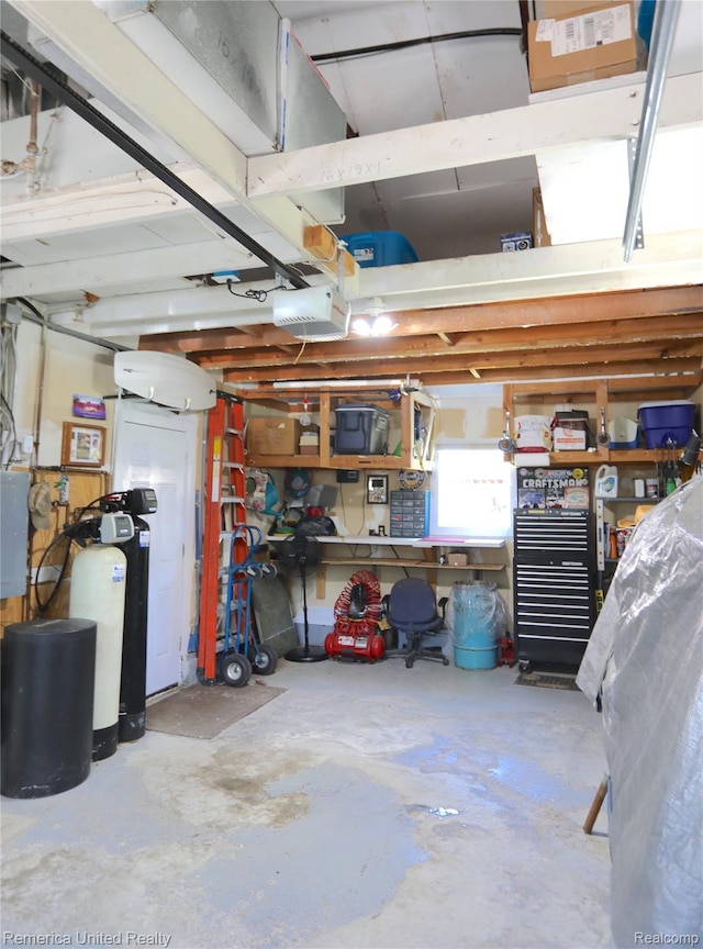 4685 Downing Dr, Pinckney, MI 48169 - garage featuring a workshop area