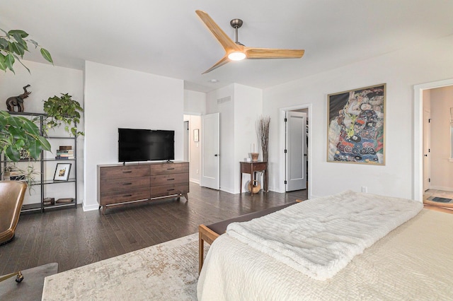 6217 S Trailwoods Dr, Ann Arbor, MI 48103 - bedroom featuring dark wood-style floors and a ceiling fan
