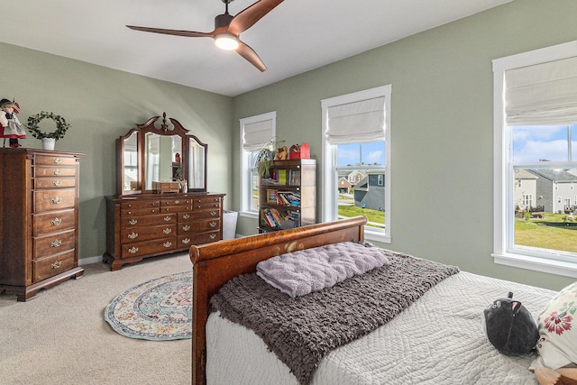 6217 S Trailwoods Dr, Ann Arbor, MI 48103 - carpeted bedroom with ceiling fan