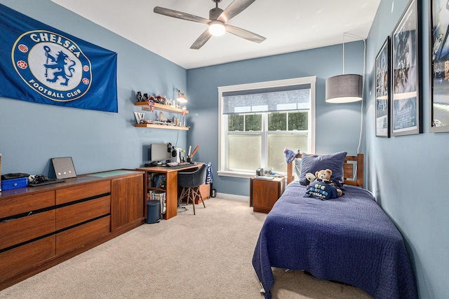 6217 S Trailwoods Dr, Ann Arbor, MI 48103 - carpeted bedroom with a desk and ceiling fan