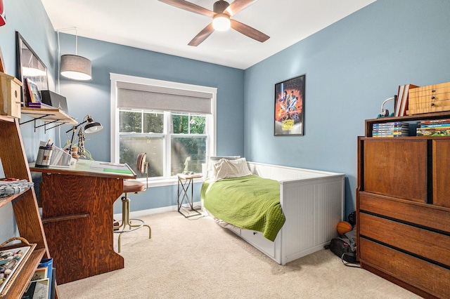 6217 S Trailwoods Dr, Ann Arbor, MI 48103 - carpeted bedroom featuring baseboards and a ceiling fan
