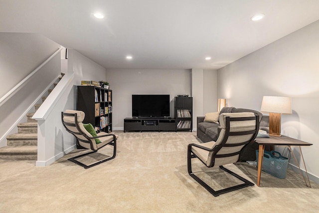 6217 S Trailwoods Dr, Ann Arbor, MI 48103 - carpeted living room with recessed lighting and stairs