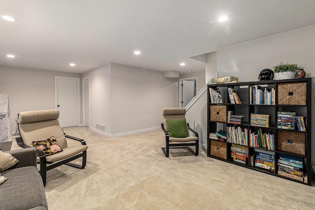 6217 S Trailwoods Dr, Ann Arbor, MI 48103 - sitting room with recessed lighting, carpet floors, and stairs