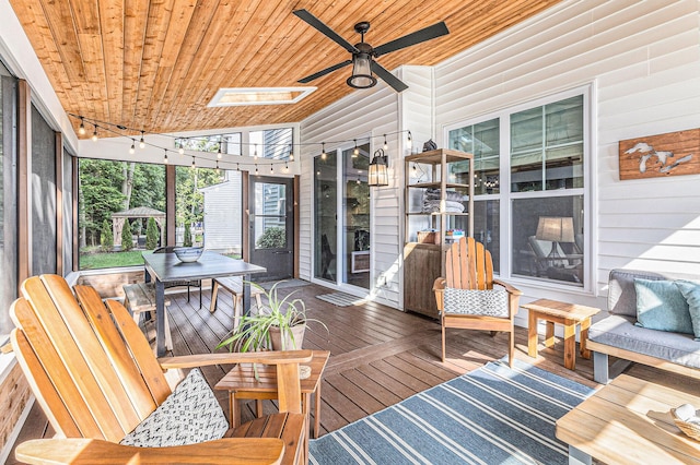 6217 S Trailwoods Dr, Ann Arbor, MI 48103 - sunroom / solarium featuring ceiling fan and outdoor dining area