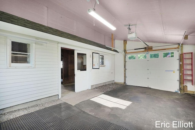 4305 76th St SW, Byron Center, MI 49315 - garage featuring a garage door opener