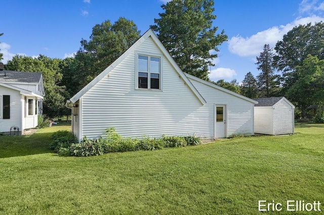 4305 76th St SW, Byron Center, MI 49315 - view of side of property with a lawn and a storage shed