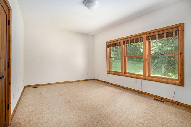 11463 Snowshoe Dr, Plainwell, MI 49080 - spare room with carpet floors and baseboards