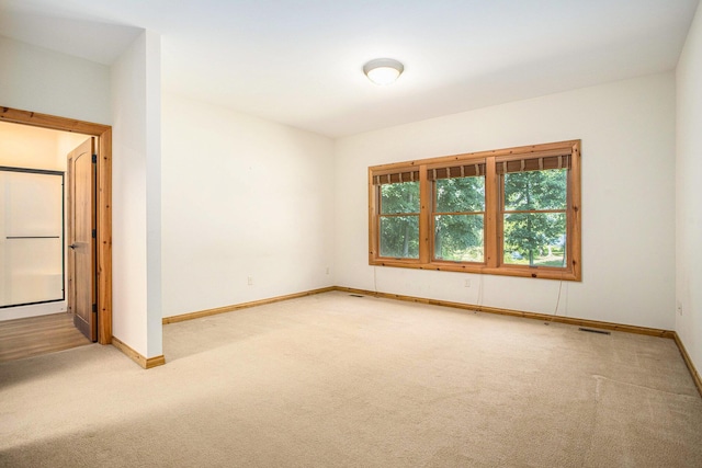 11463 Snowshoe Dr, Plainwell, MI 49080 - carpeted empty room with baseboards