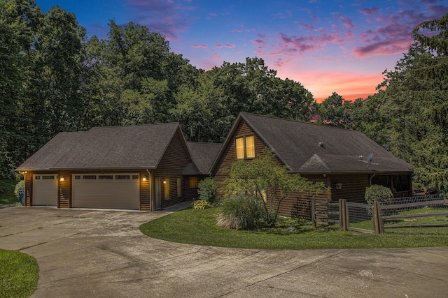 11463 Snowshoe Dr, Plainwell, MI 49080 - view of front of house featuring an attached garage and concrete driveway